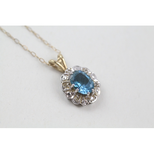 133 - 9ct gold blue topaz & diamond pendant necklace (1.9g)