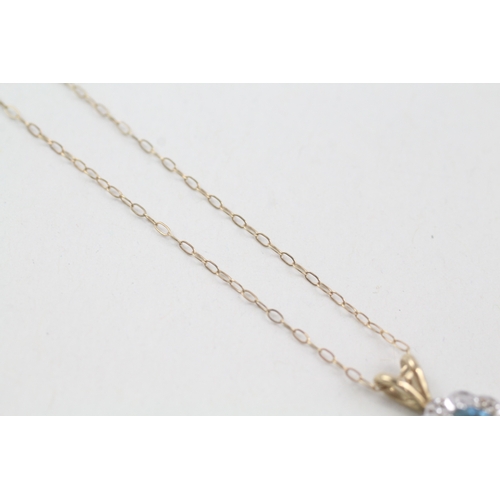 133 - 9ct gold blue topaz & diamond pendant necklace (1.9g)