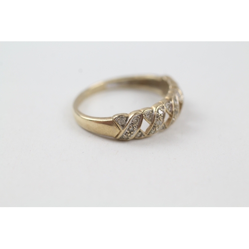 137 - 9ct gold diamond kiss design dress ring (1.8g) Size  O 1/2