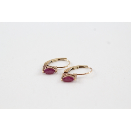 143 - 9ct gold marquise cut ruby lever back earrings (1g)