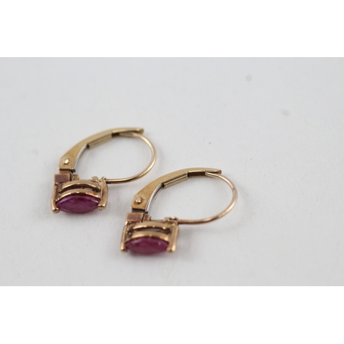 143 - 9ct gold marquise cut ruby lever back earrings (1g)