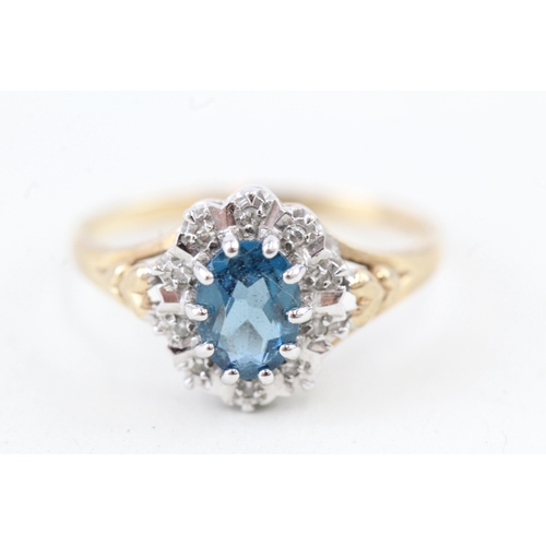 149 - 9ct gold blue topaz & diamond dress ring (1.9g) Size  O