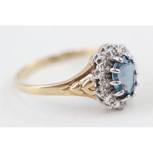 149 - 9ct gold blue topaz & diamond dress ring (1.9g) Size  O