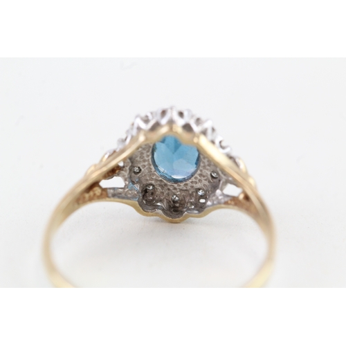 149 - 9ct gold blue topaz & diamond dress ring (1.9g) Size  O