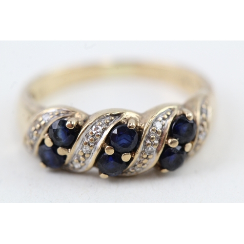 154 - 9ct gold sapphire & diamond dress ring (2.4g) Size  L