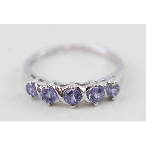 37 - 9ct gold tanzanite half eternity ring (1.6g) Size  J 1/2