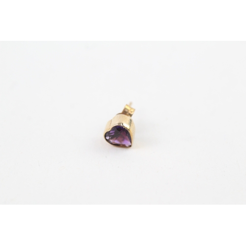 57 - 9ct gold amethyst heart shape stud earrings with scroll backs (1.2g)