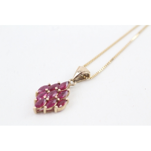 59 - 9ct gold marquise cut ruby pendant necklace (2.9g)