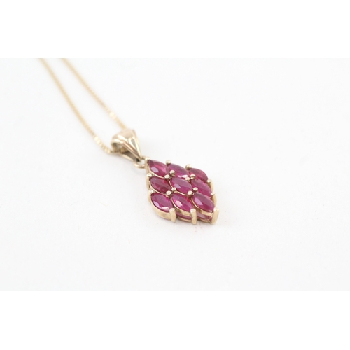 59 - 9ct gold marquise cut ruby pendant necklace (2.9g)