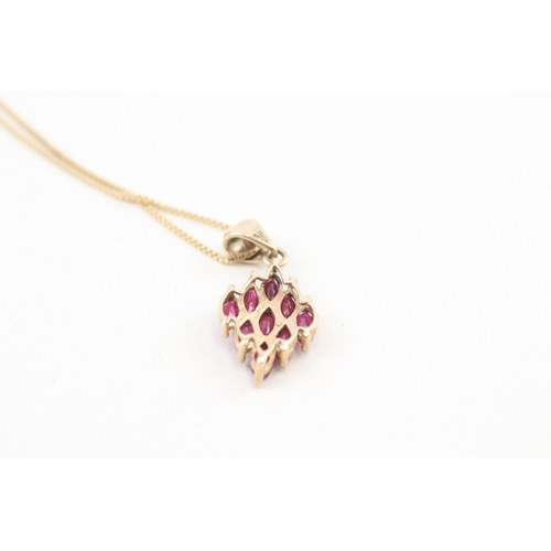 59 - 9ct gold marquise cut ruby pendant necklace (2.9g)