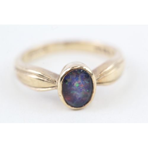 6 - 9ct gold opal triplet dress ring, bezel set (3g) Size  K