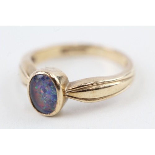 6 - 9ct gold opal triplet dress ring, bezel set (3g) Size  K