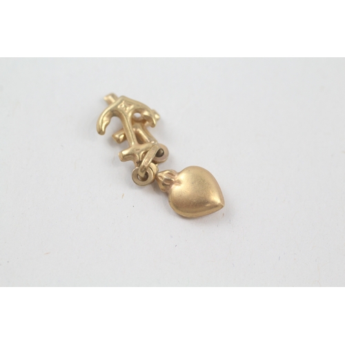 62 - 9ct gold love, faith & charity charm (0.9g)