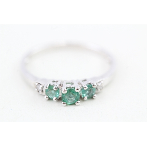 63 - 9ct gold emerald & diamond ring, claw set (1.9g) Size  N