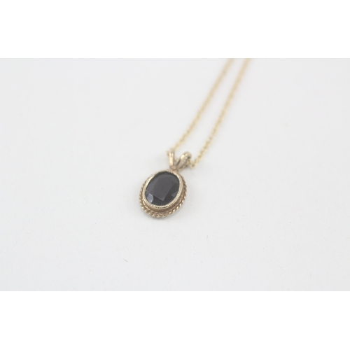 64 - 9ct gold sapphire pendant necklace (1.8g)