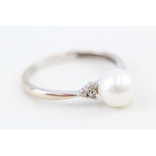 67 - 9ct gold cultured pearl & diamond dress ring (1.6g) Size  N