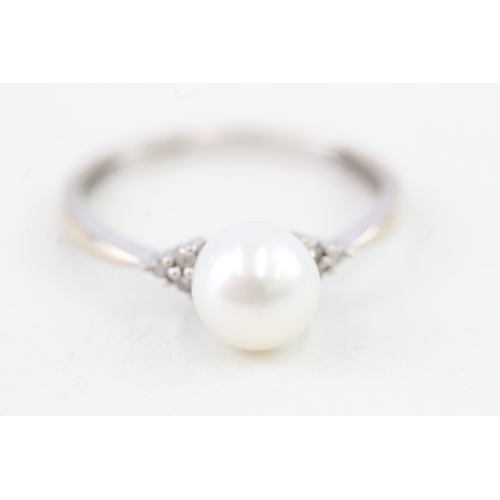 67 - 9ct gold cultured pearl & diamond dress ring (1.6g) Size  N