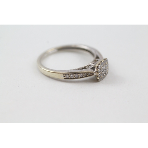 69 - 9ct gold diamond dress ring (2.6g) Size  O