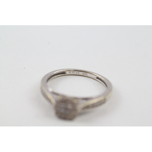 69 - 9ct gold diamond dress ring (2.6g) Size  O