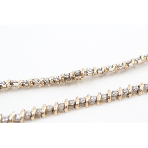 77 - 9ct gold diamond line bracelet (7.1g)