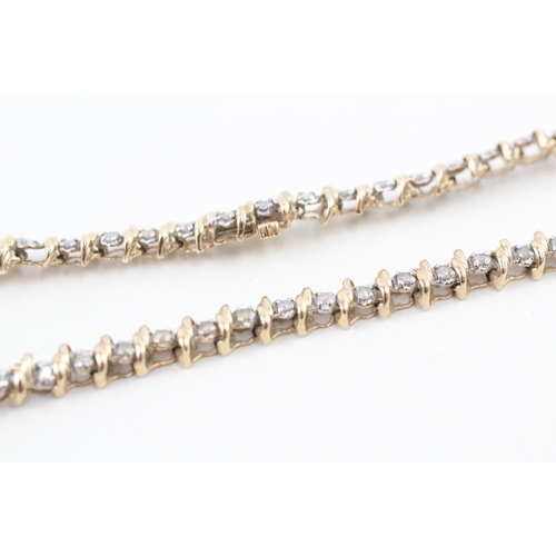 77 - 9ct gold diamond line bracelet (7.1g)