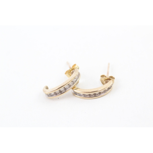 78 - 9ct gold diamond c-hoop earrings with scroll backs (2.1g)