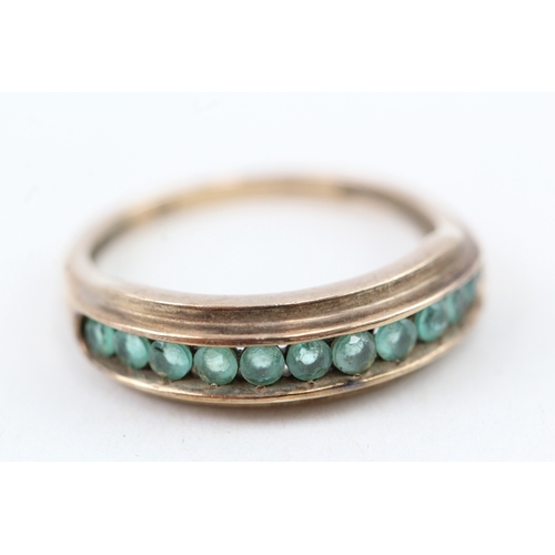 93 - 9ct gold emerald half eternity ring (2.4g) Size  O