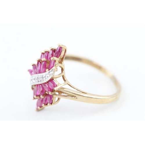 98 - 9ct gold marquise cut ruby & diamond dress ring (2.2g) Size  M