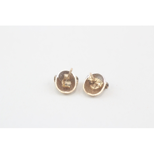 99 - 9ct gold diamond stud earrings with scroll backs (1.1g)