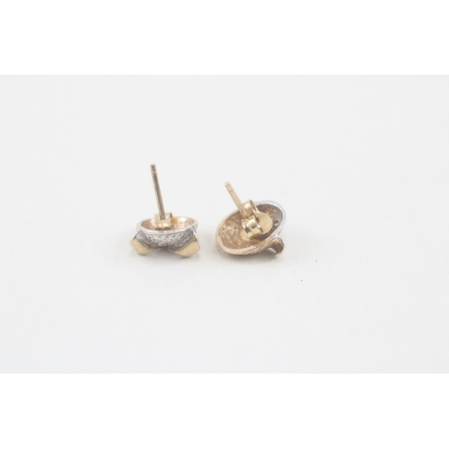 99 - 9ct gold diamond stud earrings with scroll backs (1.1g)