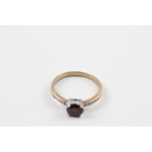 15 - 9ct gold round cut garnet solitaire dress ring with diamond set shoulders (2g) Size  L 1/2