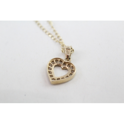 29 - 9ct gold diamond heart shape pendant necklace (2.2g)