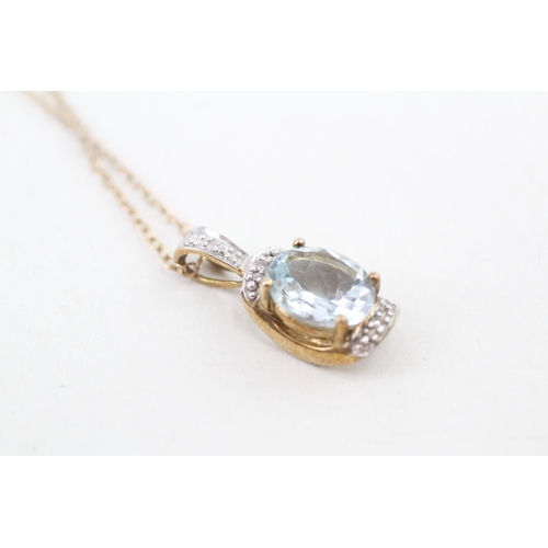 50 - 9ct gold oval cut aquamarine & diamond pendant necklace (2.5g)