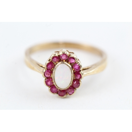 54 - 9ct gold opal & ruby cluster ring (2.4g) Size  O