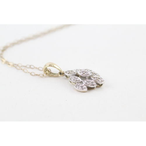 63 - 9ct gold diamond pendant necklace (1.2g)