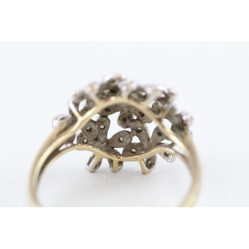 70 - 9ct gold diamond floral dress ring (3.6g) Size  T