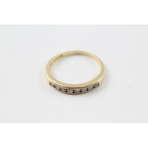 79 - 18ct gold channel set diamond half eternity dress ring (2.5g) Size  P