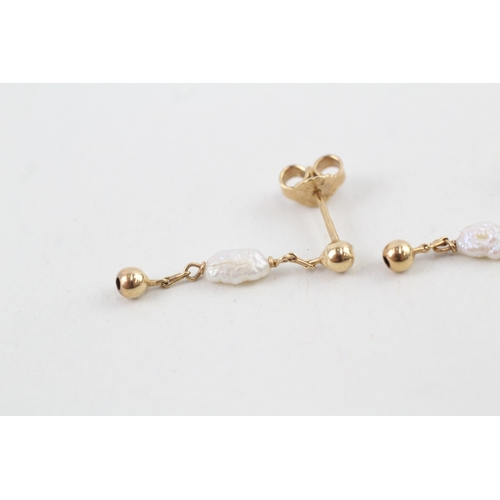 88 - 9ct gold rice pearl drop earrings with scroll backs (1.3g)