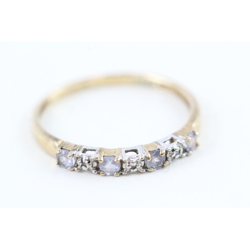 90 - 9ct gold tanzanite & diamond half eternity ring (1.1g) Size  O