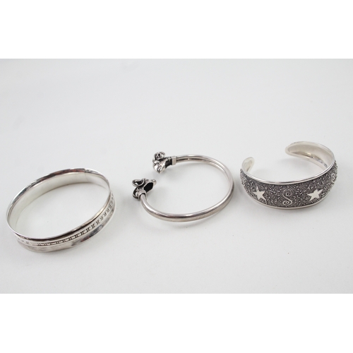 281 - Collection of Sterling Silver Bangles inc. Ram, Star, Textured. Spinner 80g