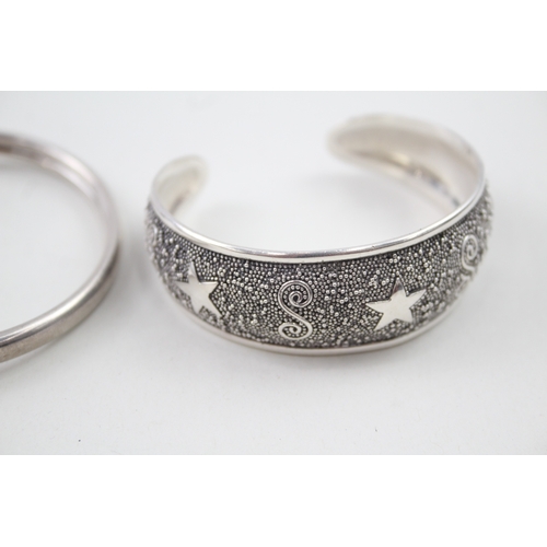 281 - Collection of Sterling Silver Bangles inc. Ram, Star, Textured. Spinner 80g