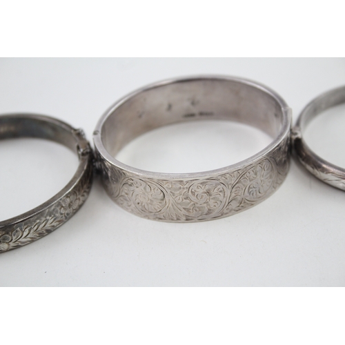 296 - Collection of Sterling Silver Mid Century Bangles inc. Floral, Scrolling 58g