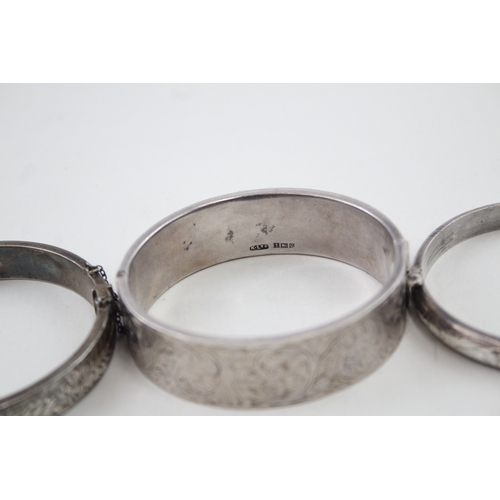 296 - Collection of Sterling Silver Mid Century Bangles inc. Floral, Scrolling 58g