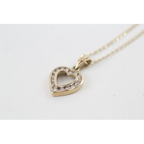 29 - 9ct gold diamond heart shape pendant necklace (2.2g)