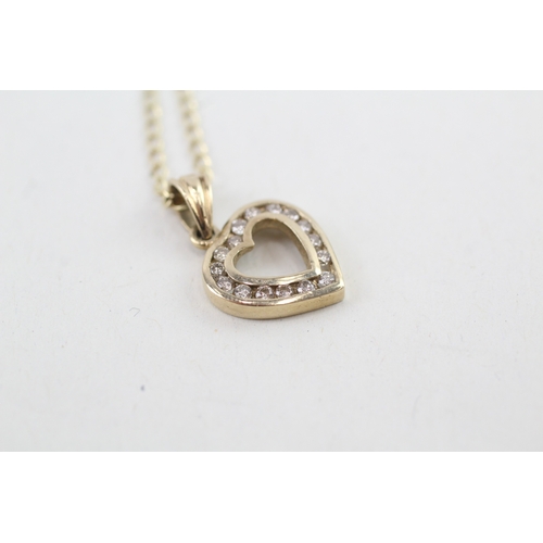 29 - 9ct gold diamond heart shape pendant necklace (2.2g)