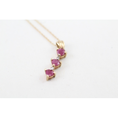 39 - 9ct gold ruby & diamond drop pendant necklace (1.1g)