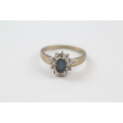 48 - 9ct gold blue topaz & diamond cluster ring (3g) Size  L