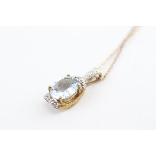 50 - 9ct gold oval cut aquamarine & diamond pendant necklace (2.5g)