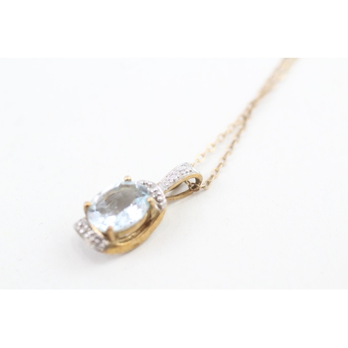 50 - 9ct gold oval cut aquamarine & diamond pendant necklace (2.5g)