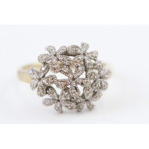 70 - 9ct gold diamond floral dress ring (3.6g) Size  T